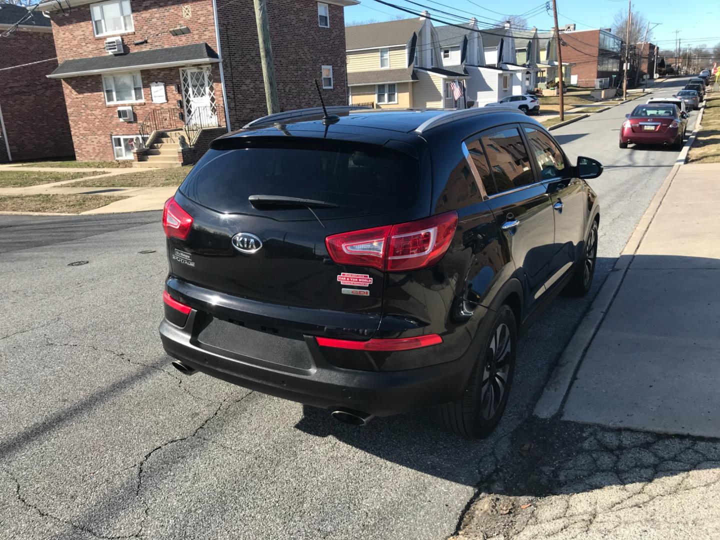 2012 Black /Black Kia Sportage EX (KNDPCCA62C7) with an 2.0 V4 engine, Automatic transmission, located at 577 Chester Pike, Prospect Park, PA, 19076, (610) 237-1015, 39.886154, -75.302338 - Photo#4